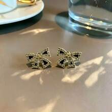 1 Pair 18K Plated Stainless Steel Black Bow Adjustable Spring Earrings, French Fashion Ins Style Suitable For Party, Date, Office Wear - Enamel Bow - View 3
