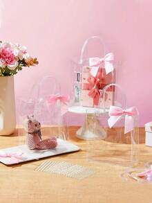 20pcs Transparent Plastic Gift Bags With Satin Bows, Approx. 15*13*7cm (5.9*5.1*2.8in), Reusable. Suitable For Weddings, Birthday Parties, Baby Showers, Bridal Showers, Party Favors, Table Decor, Gift Wrapping, Adult Parties, Bachelorette Parties, Bridesmaid Gifts, And Wedding Guest Favors - Pink Ribbon Transparent Bag - View 8
