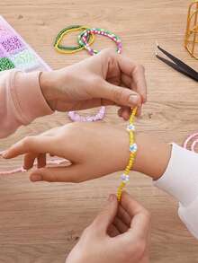Kit de fabricación de joyas DIY - Caja de 15 compartimentos con cuentas de vidrio de unicolor tipo arroz y tubo para pulseras y collares - Multicolor - Ver 7