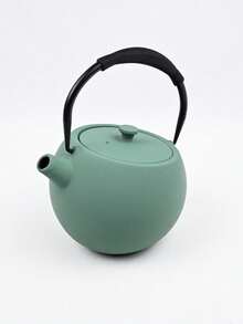 A Japanese-Style Cast Iron Teapot, Suitable For Brewing Tea Over A Fireplace, Perfect For Home Use As A Tea Set. It Features An Open Flame And A Handle, And Comes In Various Textured Designs. Sizes Range From 780-1200ml. - Fog Green Iron Kettle (850ml) - View 2