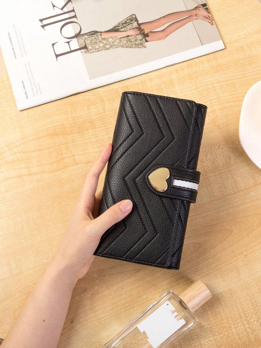 Portefeuille long pour femmes avec décoration métallique en forme de cœur, portefeuille à trois volets multifonction avec fentes pour cartes multiples et gaufrage - Noir - Voir 1