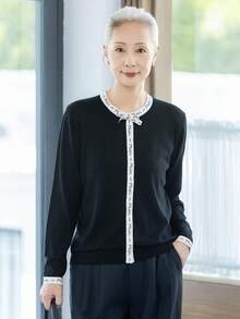 女款時尚黑色羊毛毛衣，蝴蝶結裝飾對比色織帶針織上衣，適合萬聖節、感恩節、聖誕節節日穿搭 - 黑色 - 查看 2
