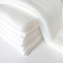 Washable High Elastic Down Composite Lining Fabric For Clothing And Bedding Products. Soft Silk-Like Regenerated Polyester Faux Silk Used For Garment And Home Textile Filling. - White - View 2