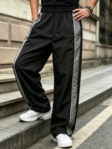 Pantalones jogger de hombre con textura arrugada de nailon, cintura con cordón, ajuste holgado, bloques de color laterales y detalles de costura, estilo casual de calle para uso diario - Gris - Ver 4