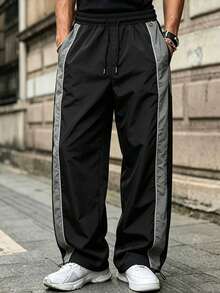 Pantalones jogger de hombre con textura arrugada de nailon, cintura con cordón, ajuste holgado, bloques de color laterales y detalles de costura, estilo casual de calle para uso diario - Gris - Ver 2