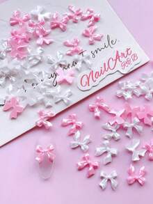 50pcs Pearlescent Shiny Bowknot 3D Resin Nail Charms, Mixed Pink & White Luster Bow Nail Art Decorations, Cute Kawaii Pearl Gloss Ribbon Bow Ornaments For DIY Manicure Acrylic Nails Salon Nail Design Accessories - Multicolor - View 3