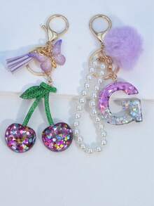 1pc Resin Starry Sky Epoxy Letter Keychain With Black Fur Ball Tassel Decor, Heart Pendant Gift For Friend And Mom - Mauve Purple - View 15