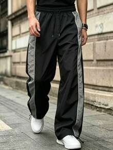Pantalones jogger de hombre con textura arrugada de nailon, cintura con cordón, ajuste holgado, bloques de color laterales y detalles de costura, estilo casual de calle para uso diario - Gris - Ver 3