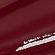 عنابي اللون
