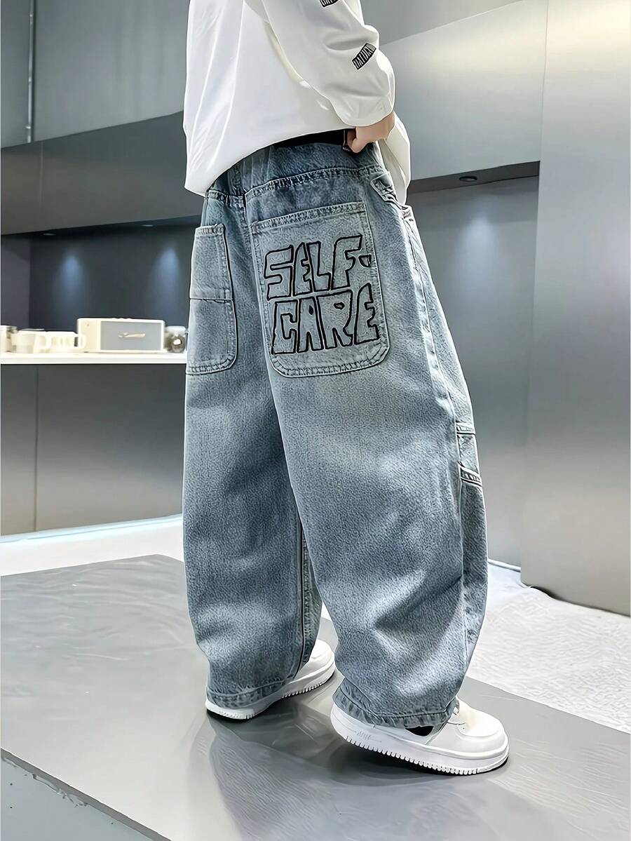 Quần jeans ống đứng thường ngày cho bé trai tuổi tween, phong cách casual, có túi và họa tiết chữ - Rửa trung bình - Xem 1