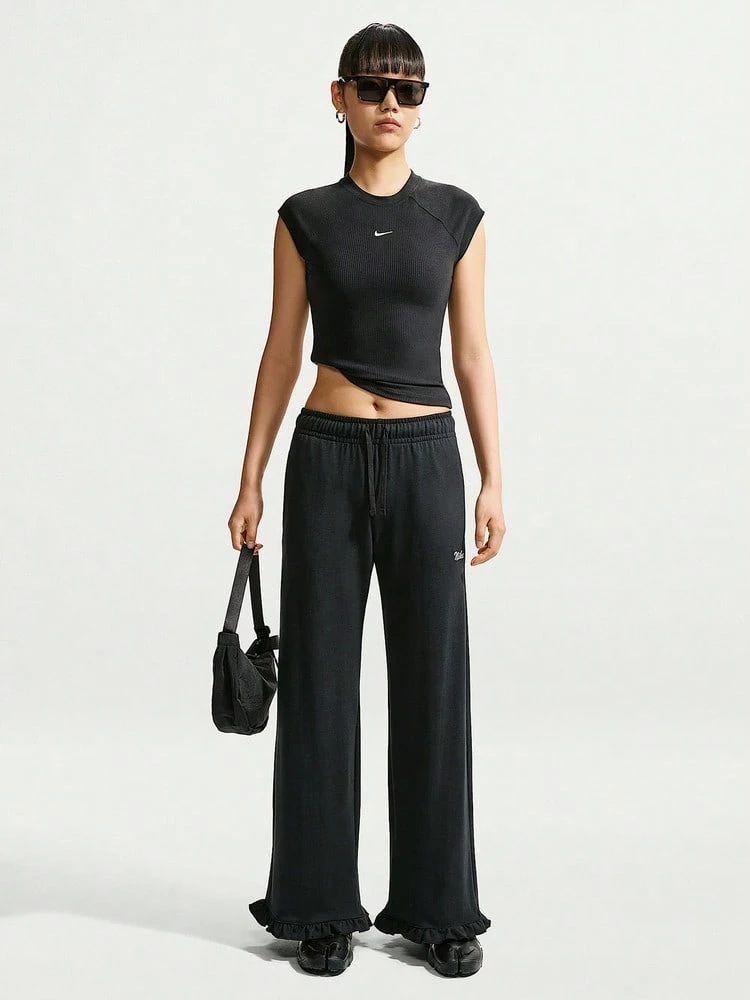 Nike Sportswear Women's Mid-Waist Long Pants, Comfortable Soft Touch With Ruffle Hem, IW1386-010 - Black - View 1