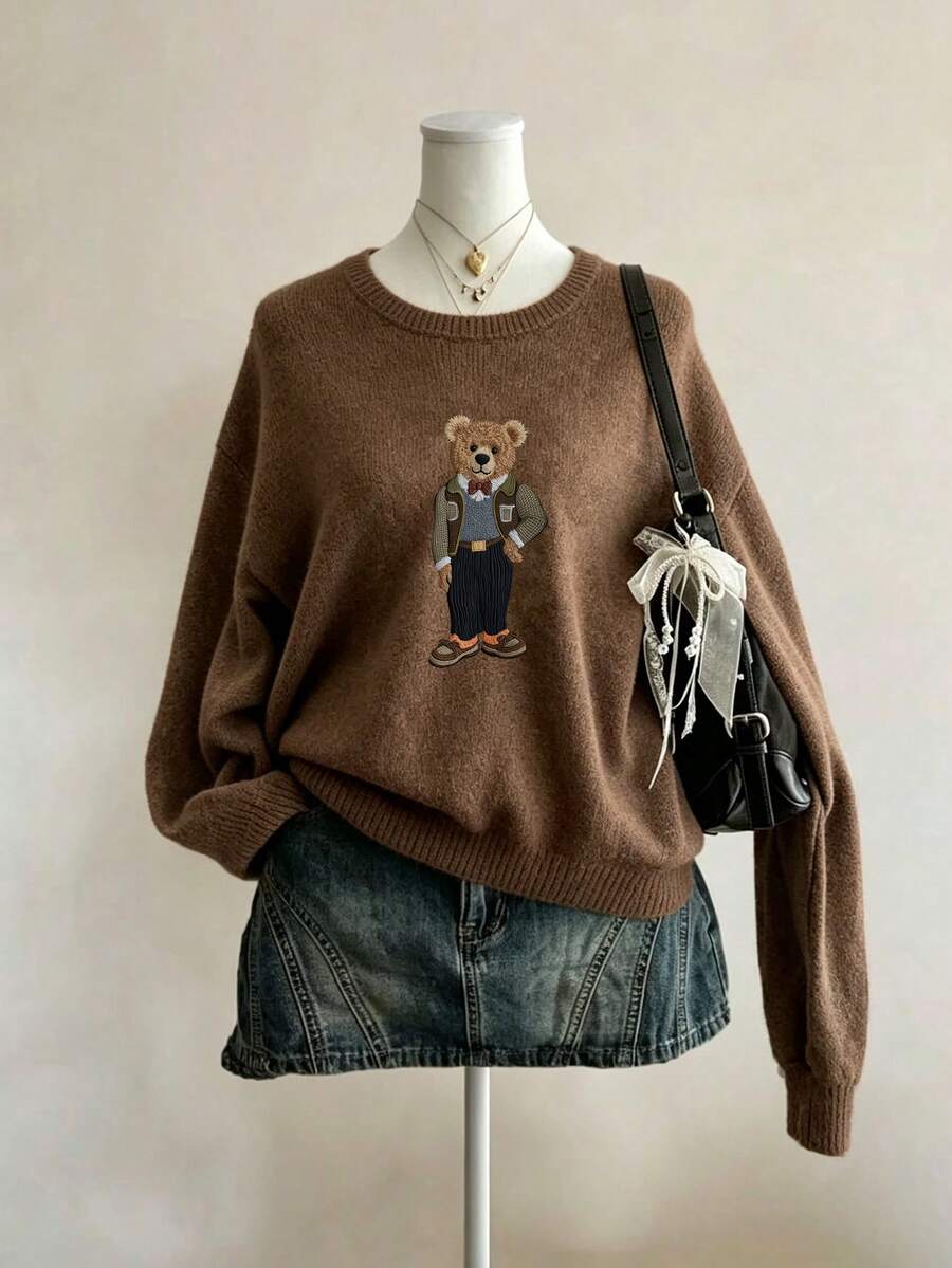 女士新款秋冬时尚毛衣,饰有复古绅士熊图案。这款宽松圆领长袖毛衣采用柔软舒适的面料制成,非常适合日常休闲穿着。属于新款秋冬系列。 - 深赭石 - 查看 1