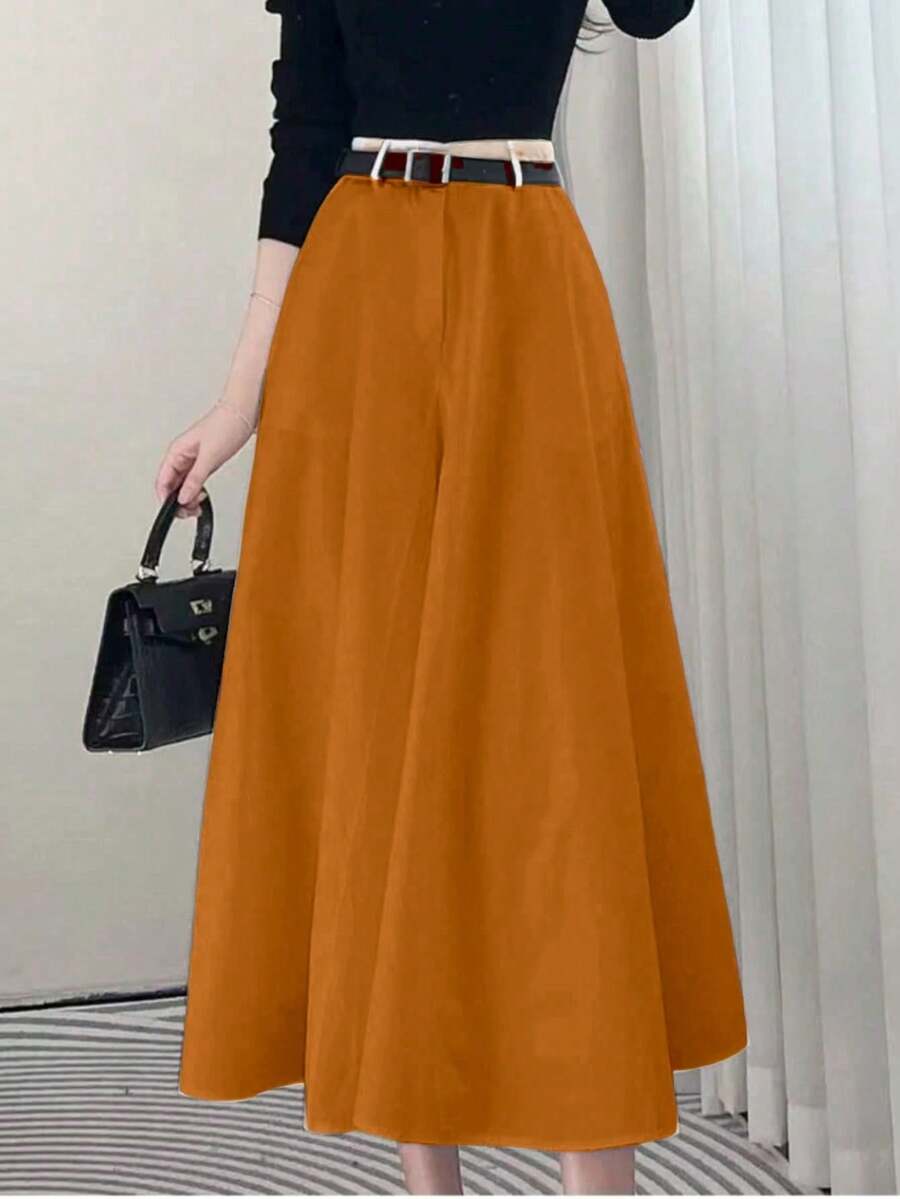 High-Waisted Solid-Colored Skirt With Pockets On Both Sides And A Wide Hem. - Rust Brown - View 1