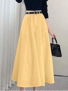 High-Waisted Solid-Colored Skirt With Pockets On Both Sides And A Wide Hem. - Yellow - View 2