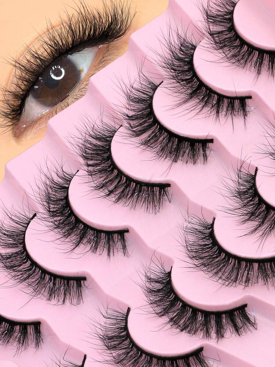 GROINNEYA 7 Pairs Thick Eyelashes Doll Eye Lashes Volume 5D False Lashes Fluffy Soft Faux Mink Eyelashes Criss Cross Natural Makeup Strip Lashes,Tail Elongated Eyelashes,Reusable Lash,For Date And Travel Essential,Party,Perfect For Everyday Wear - Black - View 1
