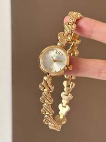 Jam tangan wanita yang elegan dan klasik ini menampilkan desain oval, pengerjaan yang indah, dan gaya yang unik. - Emas - View 11