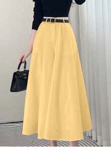 High-Waisted Solid-Colored Skirt With Pockets On Both Sides And A Wide Hem. - Yellow - View 1