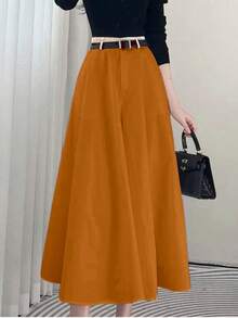 High-Waisted Solid-Colored Skirt With Pockets On Both Sides And A Wide Hem. - Rust Brown - View 2
