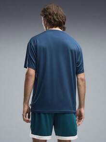 Puma Kaos Latihan TEAM ROAR Pria I - Biru Petroleum Tengah Malam, Kaos Rajut Lengan Pendek Tanpa Kerah 52920002 - Navy Blue - View 2