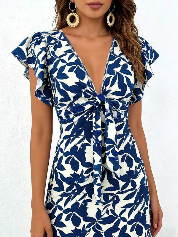2026 Nouvelle robe à col en V, taille froufrou, imprimé feuilles, manches courtes plissées. Élégante tenue d'été pour les vacances