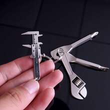 Mini Calibrador Vernier de Bolsillo y Juego de Herramientas de Reparación con Destornillador - Juego de Herramientas de Medición - Para Herramientas de Reparación del Hogar - Herramienta Ideal para el Proceso de Fabricación - Herramienta Mini Práctica Perfecta para Llevar en una Mochila - Juego de miniherramientas cuatro en uno - Juego de calibradores Vernier - Ver 4