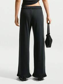 Nike Sportswear Women's Mid-Waist Long Pants, Comfortable Soft Touch With Ruffle Hem, IW1386-010 - Black - View 3
