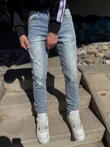 Slim Fit Distressed Stretch Denim Jeans, Blue Wash With Natural Fading And Multiple Frayed Ripped Details, Soft And Elastic Fabric, Creating A Rebellious Vintage Street Style - Blue - View 1