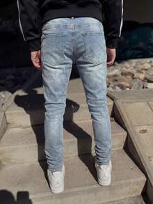Slim Fit Distressed Stretch Denim Jeans, Blue Wash With Natural Fading And Multiple Frayed Ripped Details, Soft And Elastic Fabric, Creating A Rebellious Vintage Street Style - Blue - View 4