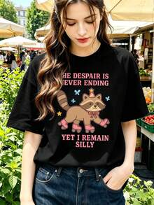 Camiseta femenina con estampado divertido de mapache, perfecta para el otoño, confeccionada en tejido de alta calidad, con cuello redondo y un corte cómodo e informal. - Negro - Ver 1