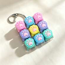 1 pieza Llavero de juguete con teclado de 9 teclas con forma de pata de gato, mini botón de tecla para alivio de presión, colgante para mochila, regalo sensorial para alivio de la ansiedad - Multicolor - Ver 18