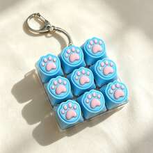 1 pieza Llavero de juguete con teclado de 9 teclas con forma de pata de gato, mini botón de tecla para alivio de presión, colgante para mochila, regalo sensorial para alivio de la ansiedad - Multicolor - Ver 20