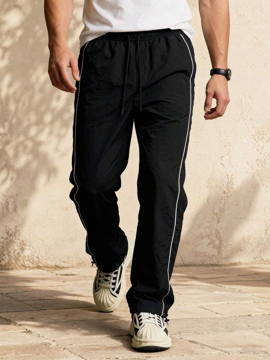 Pantalones deportivos casuales de verano para hombres con cintura elástica y cordón, diseño unisex, adecuados para primavera y otoño, con rayas y contraste de color - Negro - Ver 1