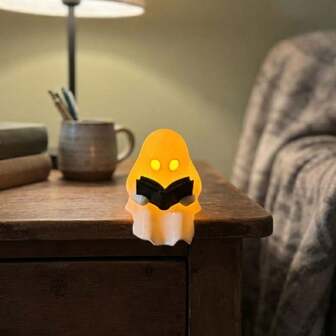 1pc Creative Cute Reading Ghost Decorative Figurine, Durable Plastic, Gift For Reading Lovers, Suitable For Halloween, Christmas, Holiday Decoration Candle Holder, Home Decor Living Room Room Desktop Ornament, Holiday Party Decoration Prop