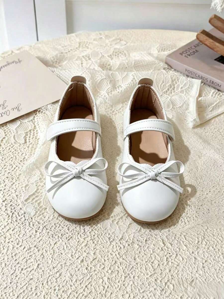 Bowknot Toe Decor, Wavy Shoe Opening Softly Modifies Foot Shape, Single Strap Secure Fit, Easy To Put On And Take Off. Flat Soft Sole Design, Lightweight Walking, Multiple Sizes Available - White - View 1