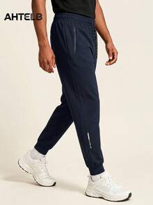 AHTELB Summer Men's Side Letter Print Sports Casual Pants, Minimalist Solid Color Fashion Elastic Drawstring Versatile Joggers, Anti-Theft Zipper Design, Suitable For Outdoor Leisure, Entertainment And Running Sports, Pants For Men, Gym Clothes Men, Sweatpants For Men, For Friends, Husband, Boyfriend Gifts - Navy Blue - View 1
