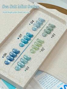 MISS SHAKA 10ml Summer Nails Ice Transparent Sea Salt Mint Blue Green Glass Bead Cat's Eye Gel Nail Polish Glue 2026 Whitening All-Match Popular In All Season Blue And Green Glass Beads Cat's Eye Nail Glue For Nail Salon Home DIY Nail Supplies - Multicolor - View 2