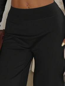 女款高腰修身提臀瑜伽褲，極簡風寬腿運動跑步褲，休閒舒適運動褲，高彈力喇叭瑜伽褲，針織面料，適合日常穿著與健身訓練，運動休閒風 - 黑色 - 查看 5