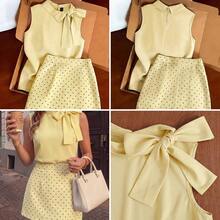 Conjunto viaje gris claro top sin mangas cuello alto falda mini lunares silueta ajustada cintura marcada tela suave fluida lazo - amarilloclaro - Ver 1