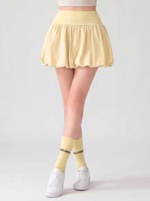 Never me Women's Athletic Skort, Fitness Golf Tennis Skirt With Pockets, Comfortable Elastic Fabric, Built-In Liners - Yellow - View 6