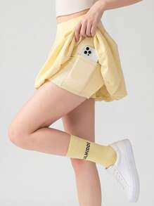 Never me Women's Athletic Skort, Fitness Golf Tennis Skirt With Pockets, Comfortable Elastic Fabric, Built-In Liners - Yellow - View 9