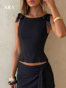 ARA CHIC Top de tirantes con lazo de satén negro, escote en U, bustier ajustado, top corto sin mangas con varillas, top elegante para mujer para verano, vacaciones, playa y brunch - Negro - Ver 2