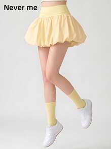 Never me Women's Athletic Skort, Fitness Golf Tennis Skirt With Pockets, Comfortable Elastic Fabric, Built-In Liners - Yellow - View 1