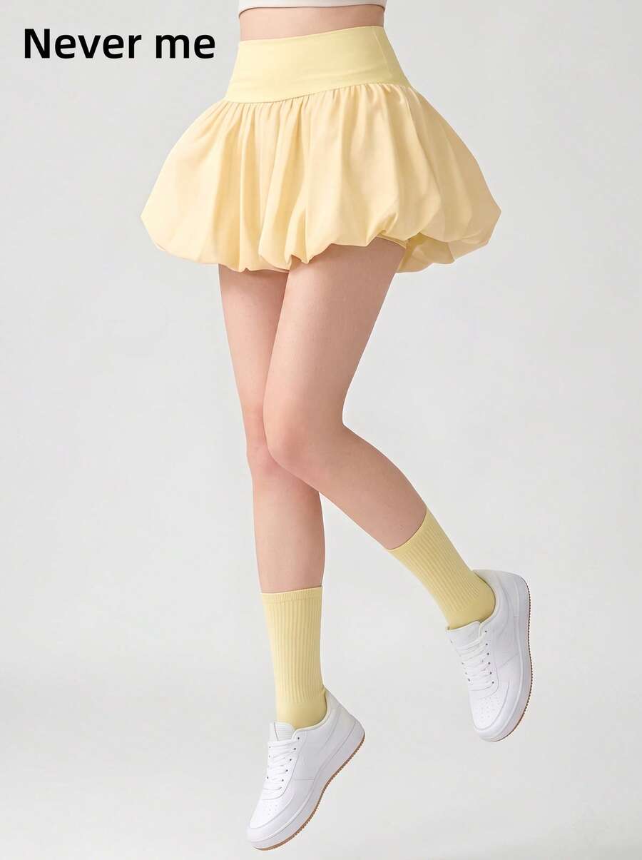 Never me Women's Athletic Skort, Fitness Golf Tennis Skirt With Pockets, Comfortable Elastic Fabric, Built-In Liners - Yellow - View 1