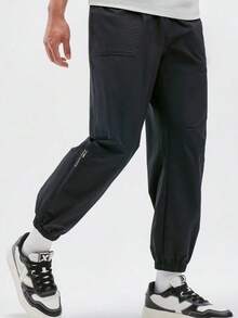 XTEP New Men's Casual Sports Cargo Pants With Tapered Leg - Black - View 1