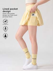 Never me Women's Athletic Skort, Fitness Golf Tennis Skirt With Pockets, Comfortable Elastic Fabric, Built-In Liners - Yellow - View 2