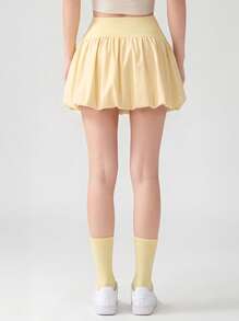 Never me Women's Athletic Skort, Fitness Golf Tennis Skirt With Pockets, Comfortable Elastic Fabric, Built-In Liners - Yellow - View 3
