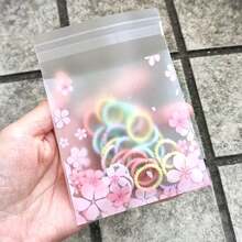 50/100/200入 粉色花卉圖案自黏包裝袋，櫻花設計，適用於婚禮、生日與節日禮品包裝 - 查看 4