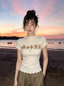 1件女款針織短袖T恤，可愛熊圖案，夏季修身短版上衣 - 杏色 - 查看 3