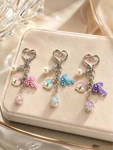1 pièce/Multi-pièces Porte-clés femme avec pendentif cœur en fausse perle, nœud et petites fleurs peintes incrustées, breloque pour sac à dos et sac - Multicolore - Voir 1