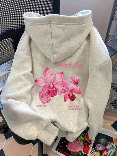 Sudadera con estampado de letras y flores en la espalda y bolsillo. Sudadera de ajuste regular para mujer, nueva llegada de otoño/invierno, top versátil y casual